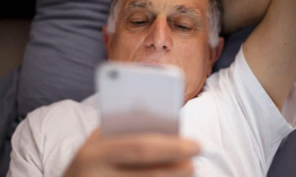 Man exchanging late night text messages with his doctor