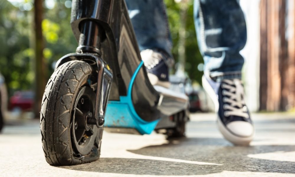 E-Scooter close up photo with a punctured tyre