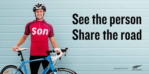 Share the road, see the person billboard